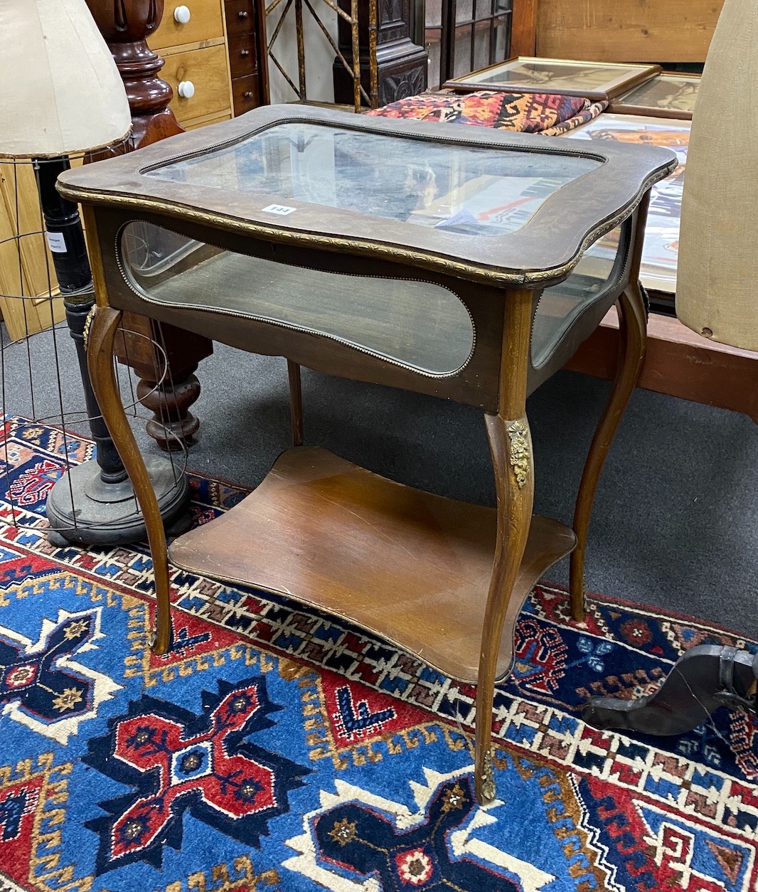 An early 20th century French gilt metal mounted marquetry inlaid bijouterie table, width 63cm, depth 48cm, height 76cm